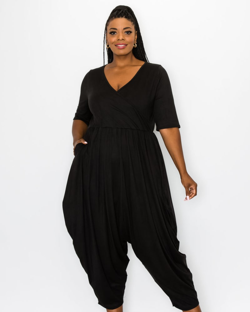 Front of a model wearing a plus size Rebecca Pocket Jumpsuit in Black by L I V D. | dia_product_style_image_id:241392